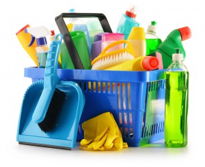 Shopping Basket With Detergent Bottles Isolated On White